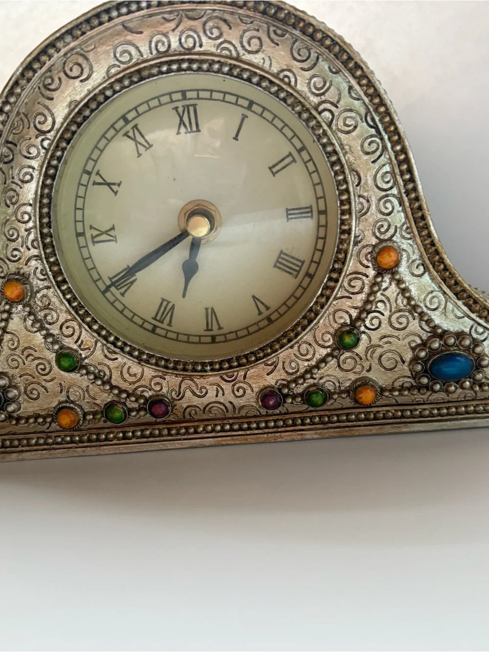 Ornate Silver-Tone Mantel Clock with Multicolor Accents